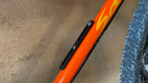 After adaptor installation, bottle cage repositioned 52mm toward BB.